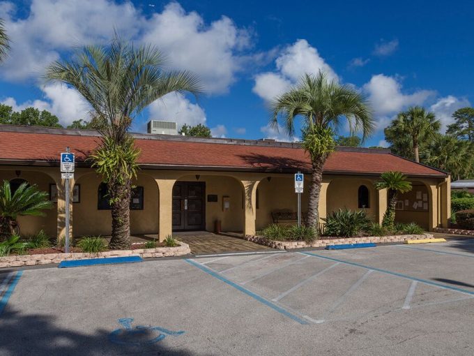 View of the Hacienda Village Clubhouse and parking lot